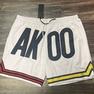 Akoo White and Red Athletic Shorts with Striped Trim